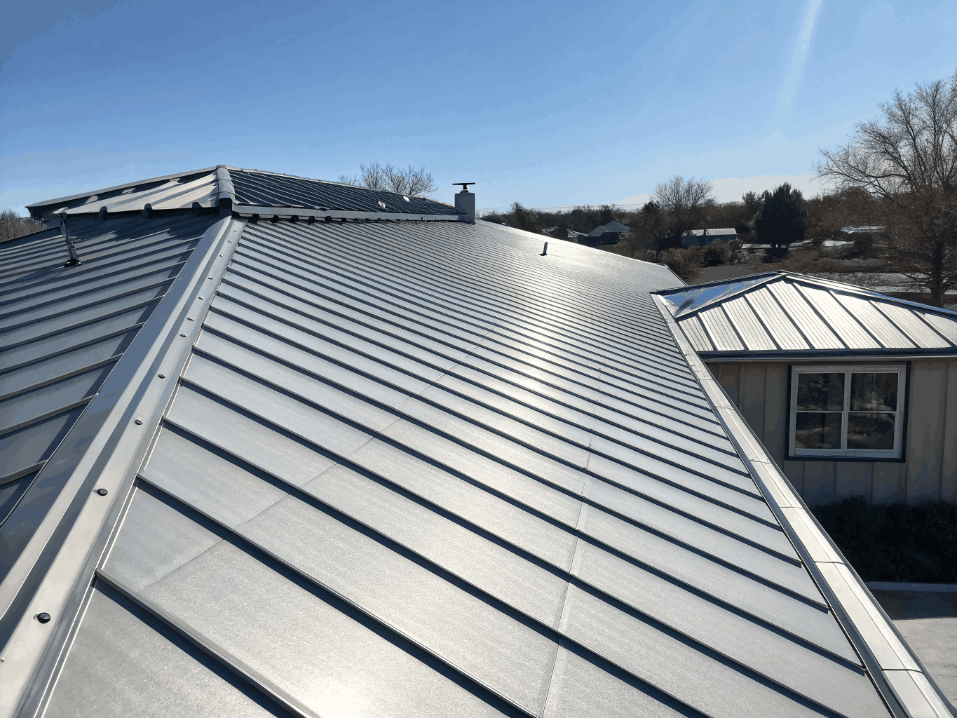 Precision standing-seam metal roof installation in the Colorado mountains
